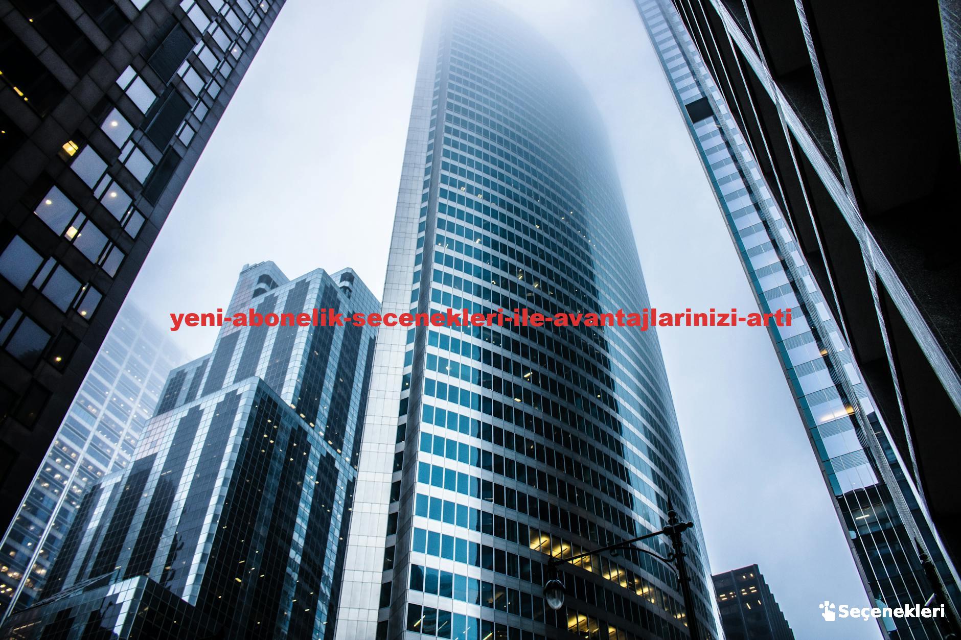 Dramatic view of modern skyscrapers shrouded in fog in an urban cityscape.