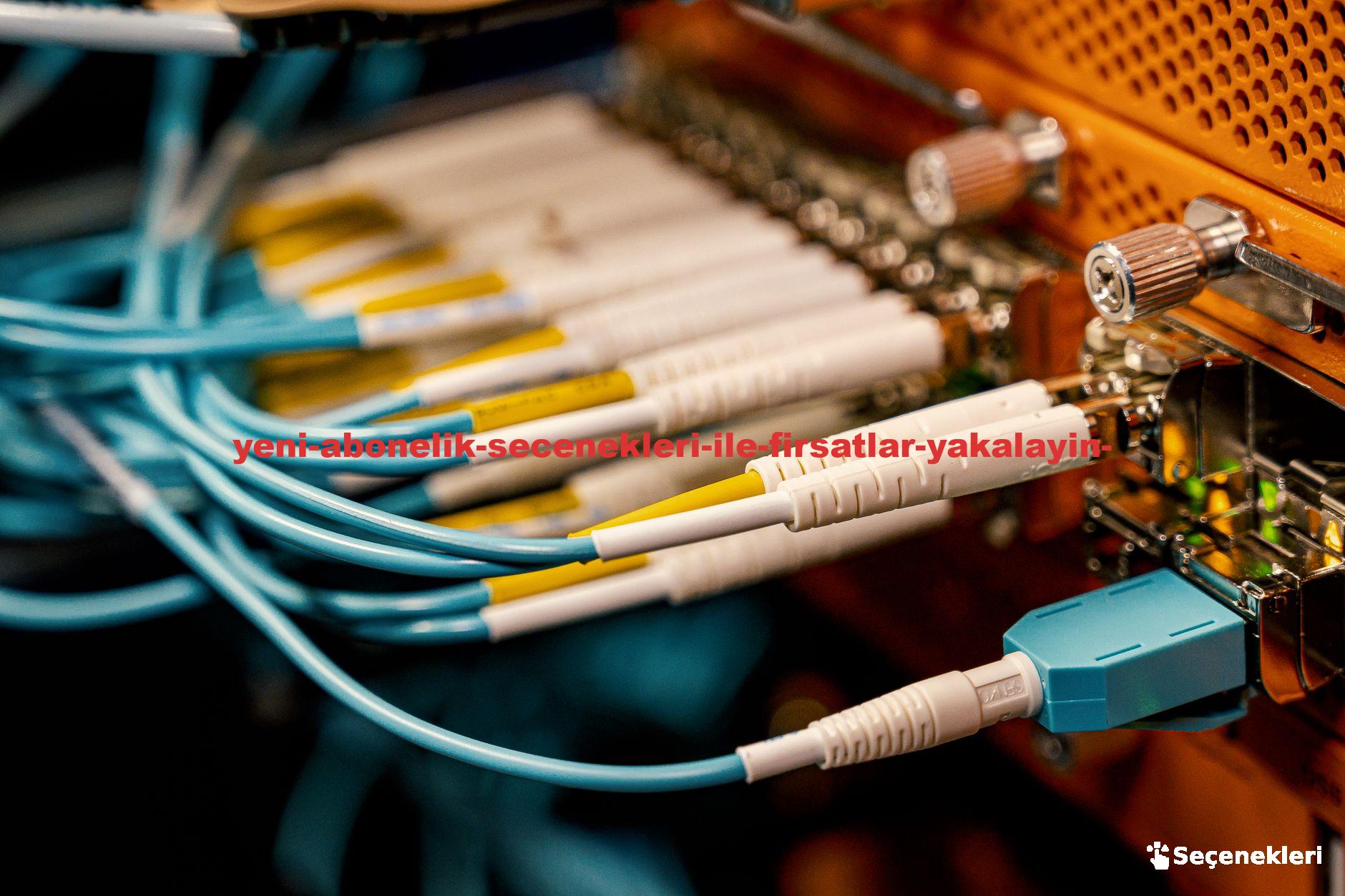 From above of optical switch equipment with many similar connectors with rubber cables and metal parts