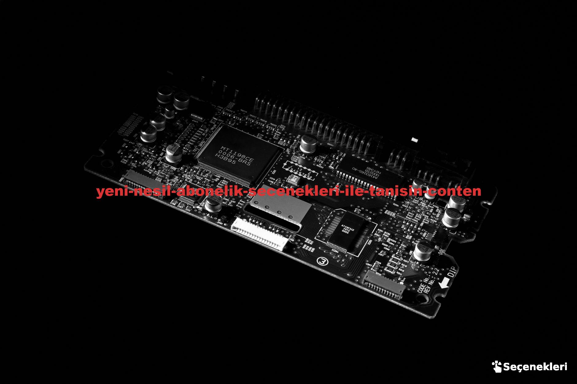 Detailed black and white image of a computer circuit board, showcasing technology components.